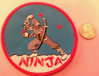 Red   Ninja fighter embroidered iron on sew on patch new old stock 4''x 4''