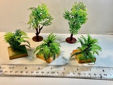Lot of five plastic assorted Tropical plants ...