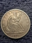 1861 Seated Liberty Half Dollar. Nice higher grade, about XF..
