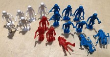 19 Vintage Plastic Space Men 1970s approx 2 inches high each red white blue
