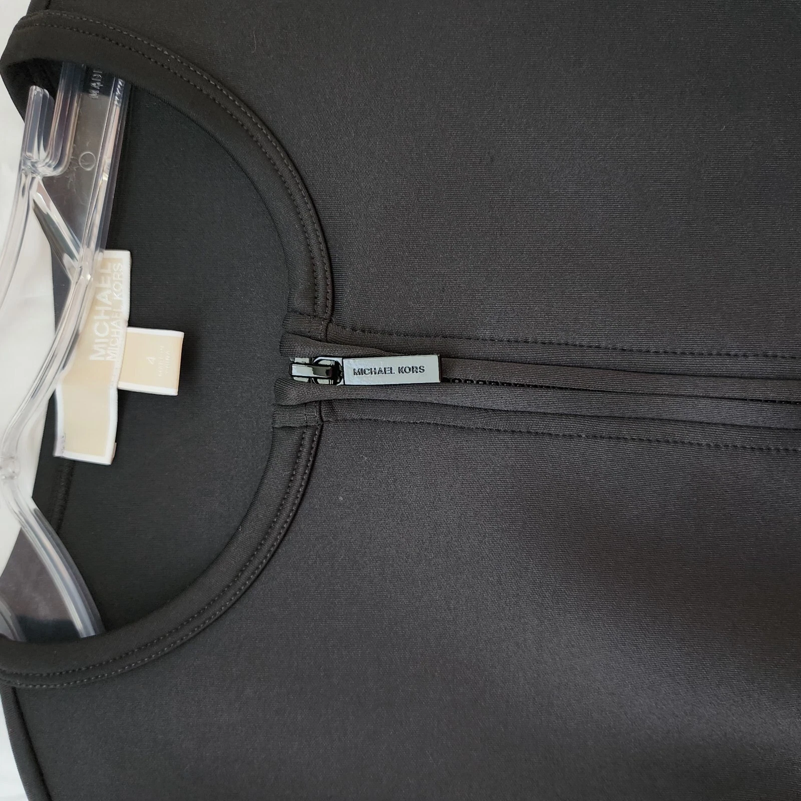 Abito body MICHAEL KORS senza maniche con zip davanti nero 4 $130 nuovo