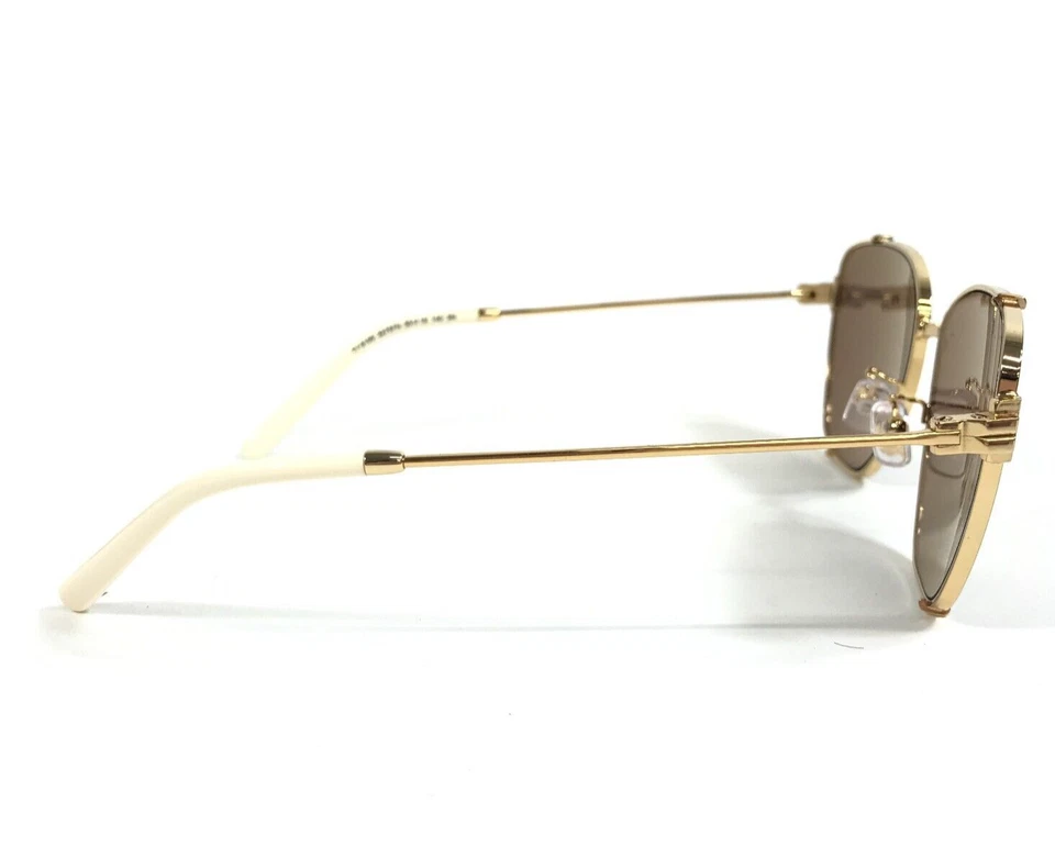 Gafas de sol Tory Burch TY6105 32787N doradas brillantes con lentes espejadas marrón púrpura claro Foto 4 de 4