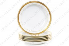 Six assiettes creuses incrustations or par Bernardaud. Six soup plates
