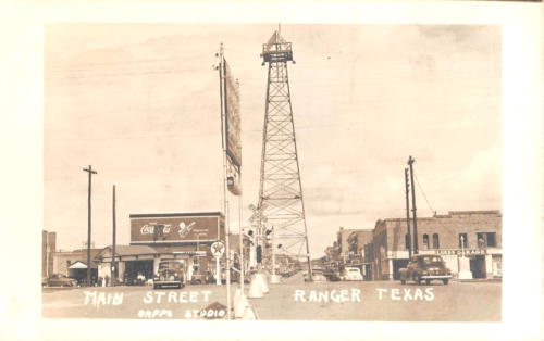 c.1940 RPPC Stores Early Cars Texaco & Coca Cola Signs Main St. Ranger TX - Afbeelding 1 van 2