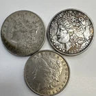 Morgan Silver Dollar Lot of 3. (1) 1881 and  (2) 1887