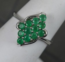 Solid Platinum and Emerald Cluster Ring