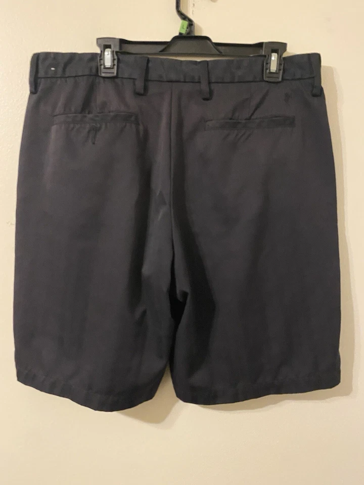 Pantalones cortos de golf Ashworth negros para hombre mezcla de algodón frente plano cintura 36 Foto 2 de 4