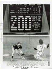 1975 Press Photo California Angel Jerry Remy steals base in front of Maxvill