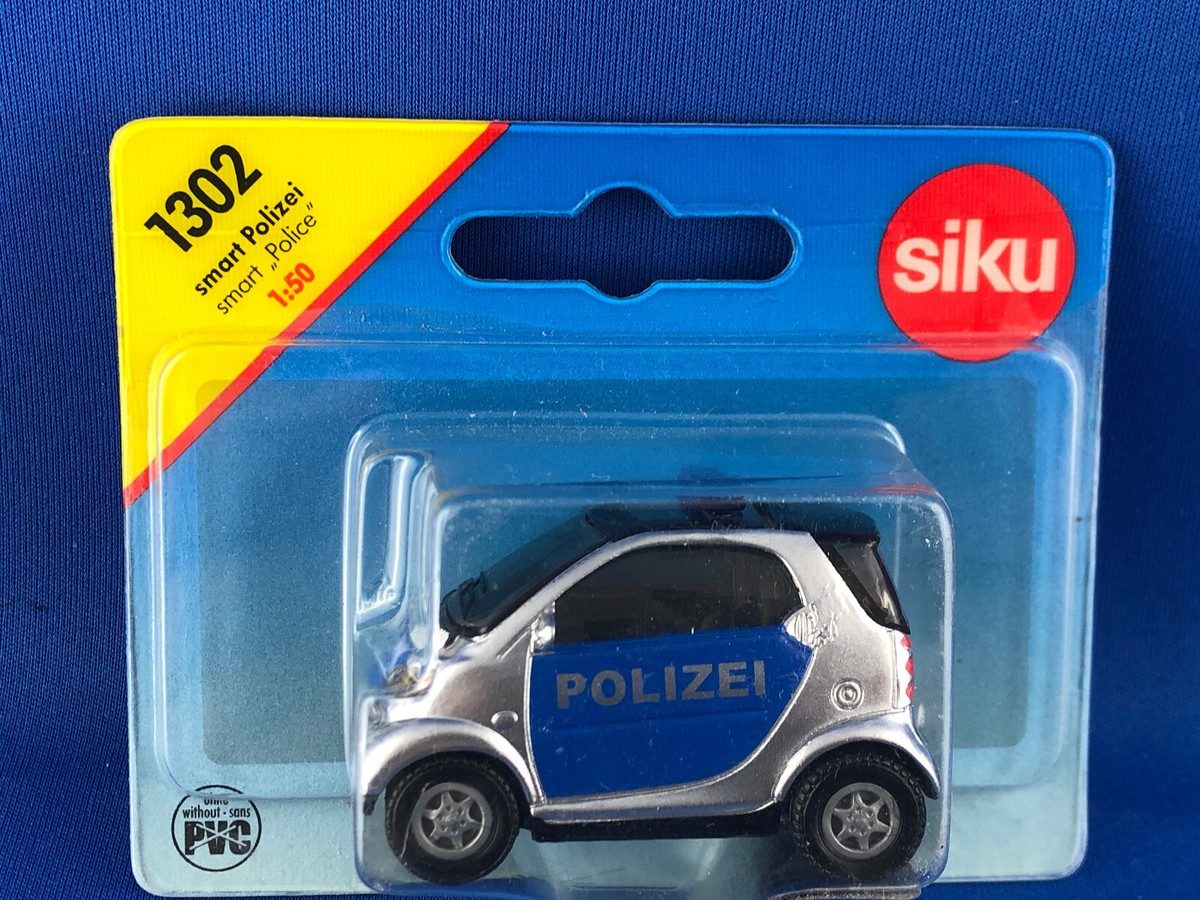 SIKU 1302 smart Polizei Police silver. 1:55. metal. blister card