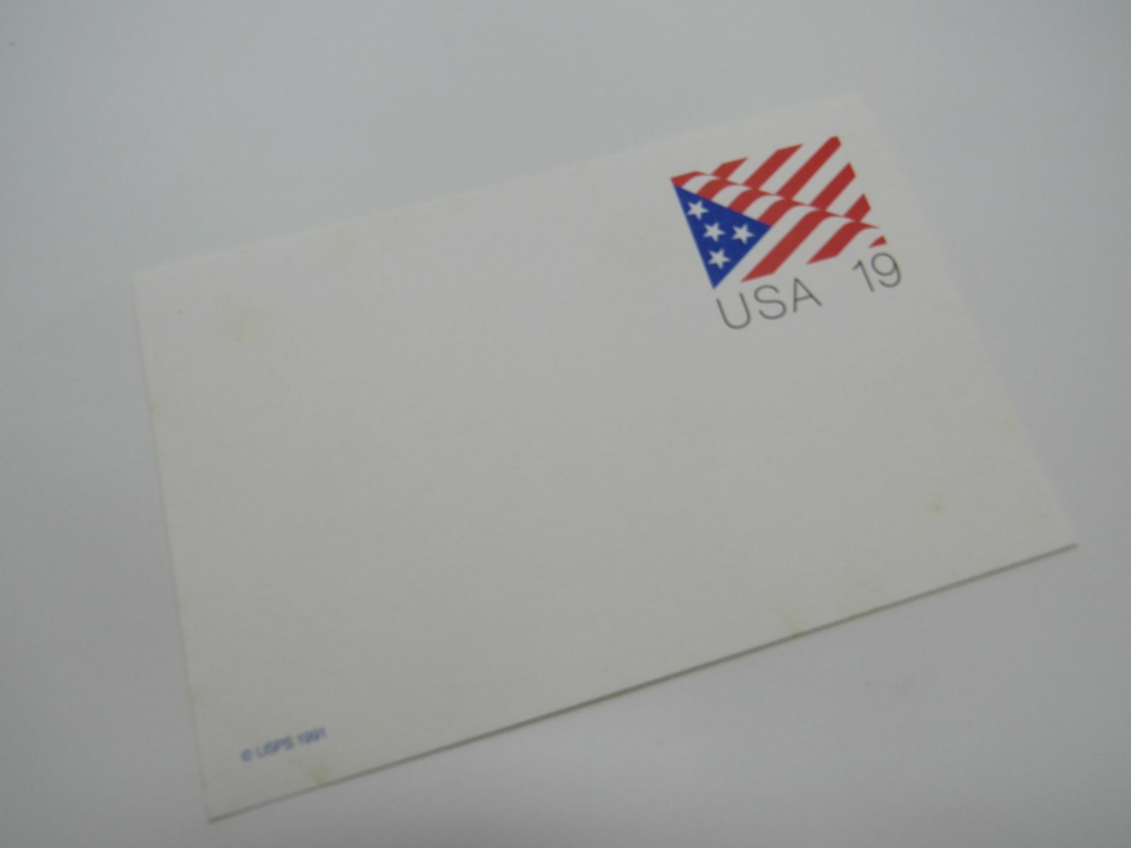 USPS UX153 19c Stylized Stars and Stripes US Flag Postal Card