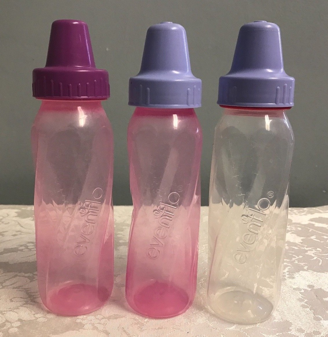 Lot of Vintage Evenflo 8oz Plastic Twisted Baby Bottles Caps Rings Pink  Purple