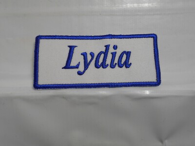 LYDIA  NEW EMBROIDERED  SEW / IRON ON NAME PATCH BLUE ON WHITE 1-1/2t X 3-1/2w