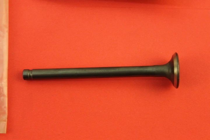 PIEZA VÁLVULA ESCAPE HONDA Z50R Z50RD ZB50 NUEVO DE LOTE # 14721-GK4-600 Foto 2 de 4