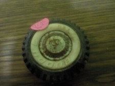 vintage buddy l pickup one tire 0ne whitewall one hub-cap for parts