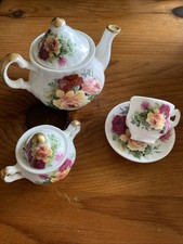 STAFFORDSHIRE  MINIATURE TEA  SET  TEA CUP AND SAUCER teapot sugar