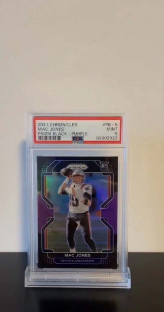 2021 Panini Chronicles - Prizm Black Mac Jones #PB-5 Purple Prizm /199 (RC)