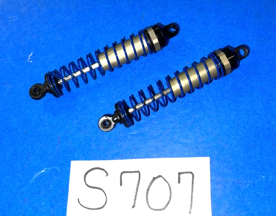 TEAM ASSOCIATED RC10 BUGGY UNUSED REAR HARD COATED SHOCKS WITH BLACK METAL CAPS - Image 2 of 4
