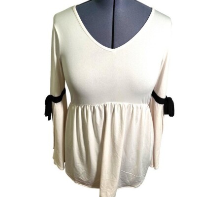 Cupio Women's Size Medium Blouse Cream V-Neck Peplum Hem Black Bows Sleeves