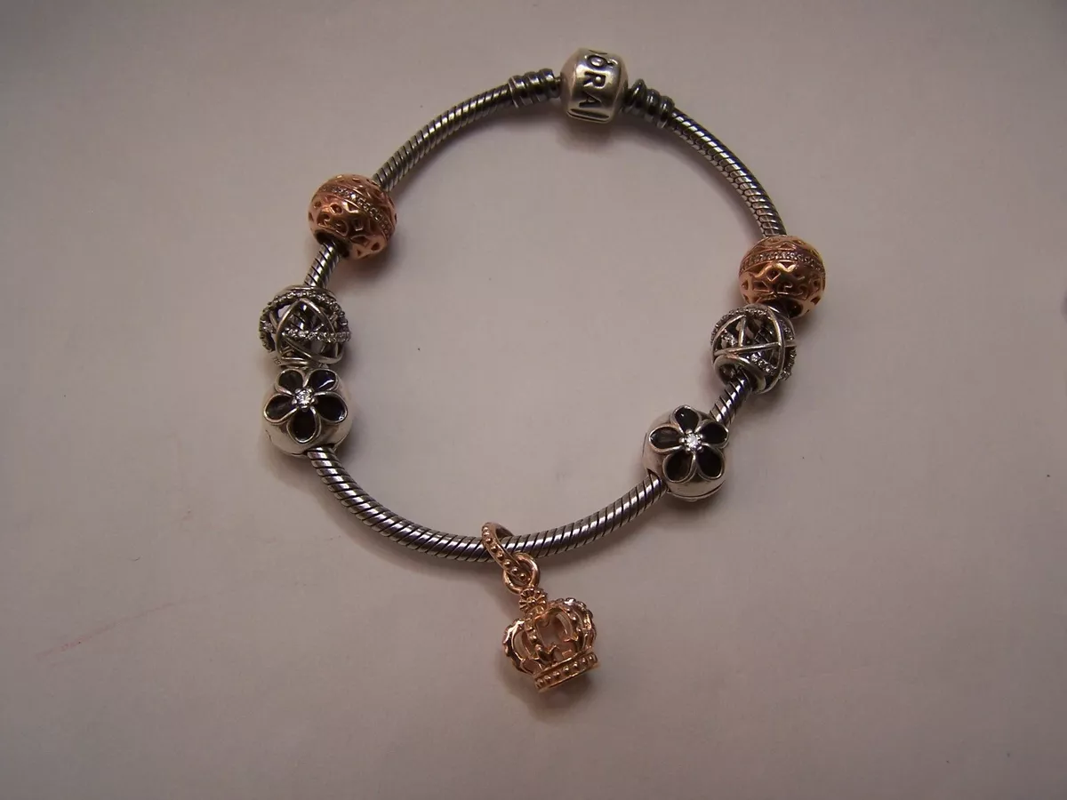 authentic retired pandora bracelet with 7 beads some rose gold charms