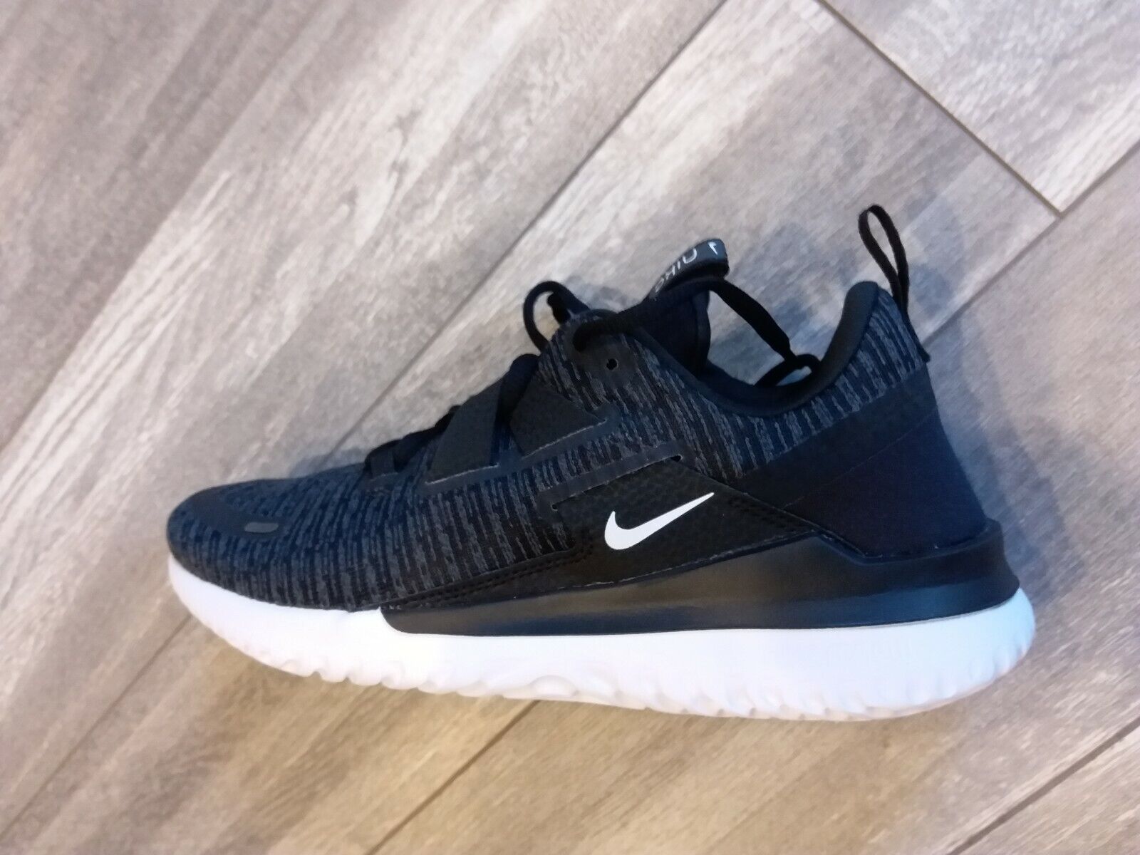 nike running renew arena trainers in black