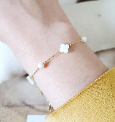 Bracelet trèfle nacre et acier inoxydable doré pour femme - Photo 1/4