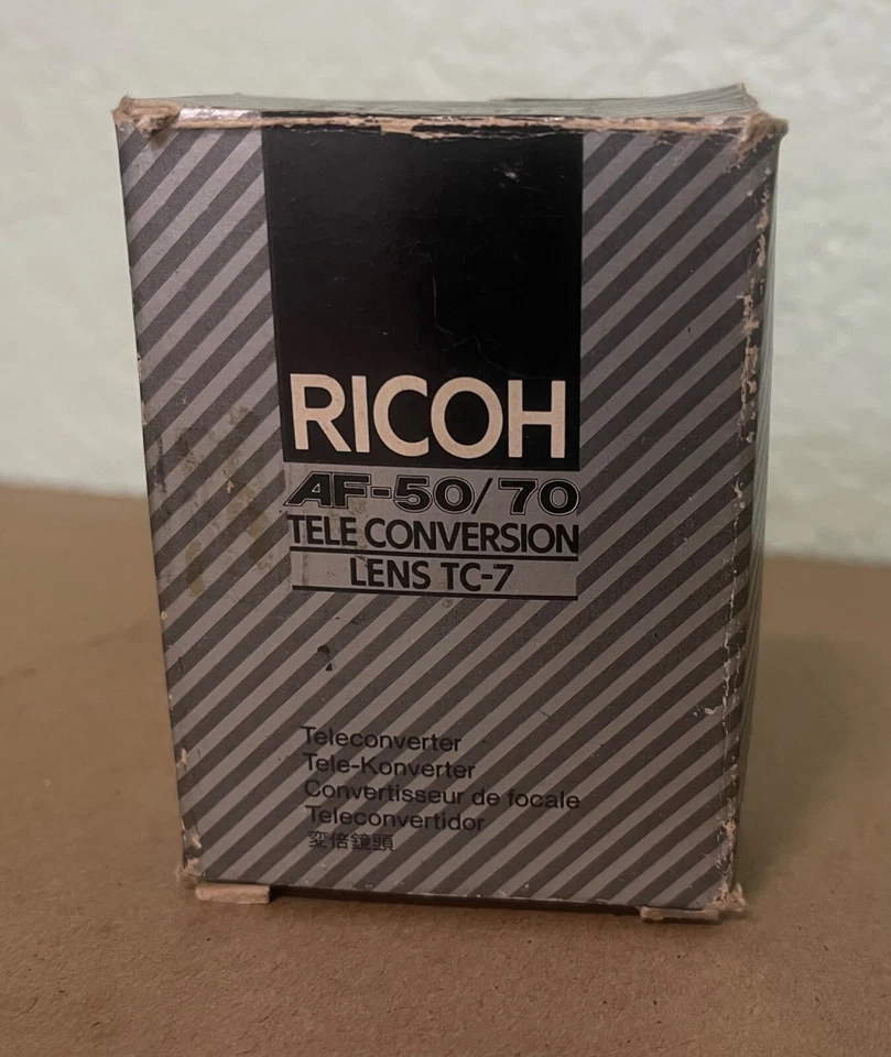 Lente de teleconversión Ricoh de colección RICOH TC-7 AF 50/70 NUEVO STOCK ANTIGUO en estuche y caja Foto 2 de 4