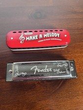 Set of 2 harmonicas Fender Blues Deluxe/Schylling Toys in good condition no case