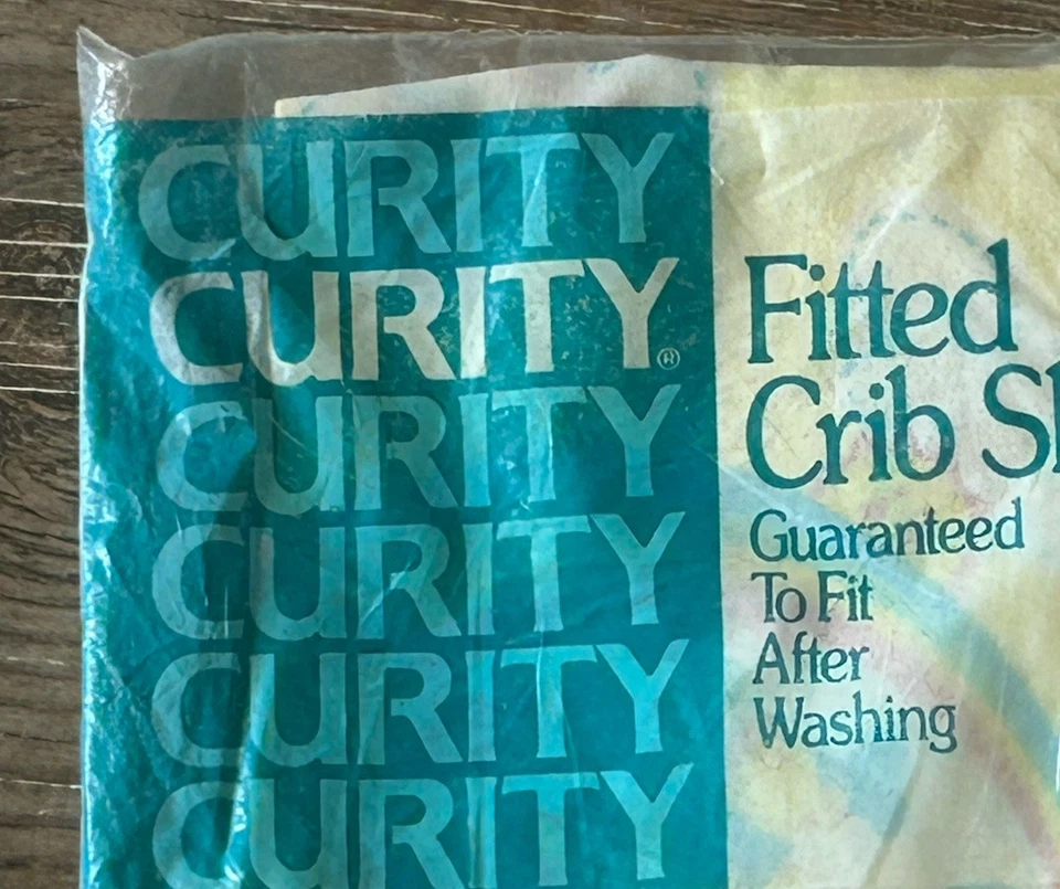 Sábana bajera ajustable CURITY de colección para arco iris de prensa permanente preencogida de 28"x52" Foto 2 de 4