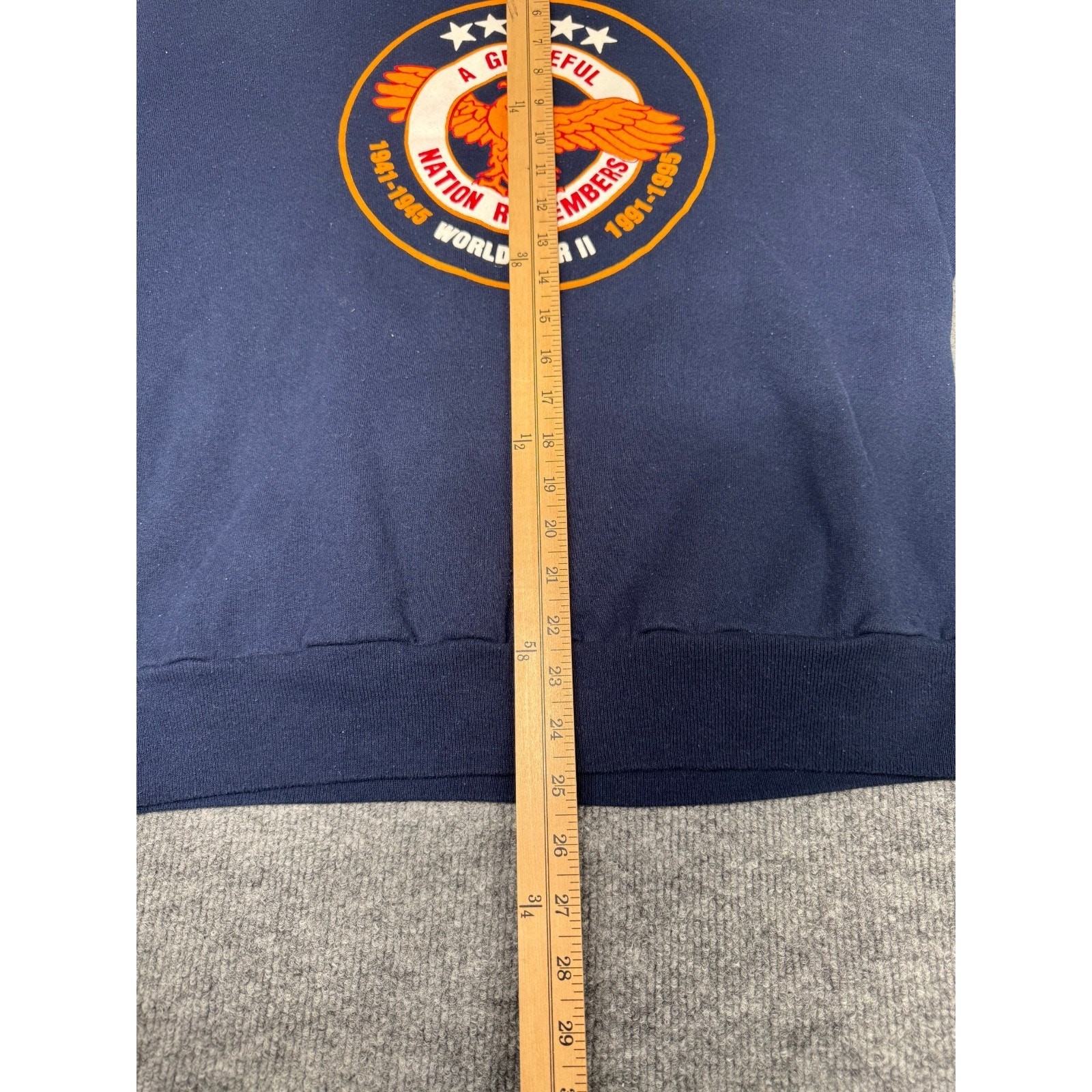 Navy and gray VTG Jerzees sweatshirt with orange star and eagle logo, white “A GIFFIL” text, and USA flag on chest.