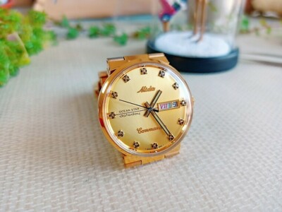 MIDO Commander Gold Ocean Star datoday Automatic Swiss ETA 2836
