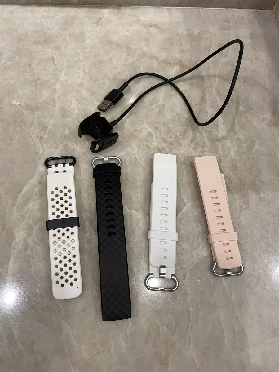 Fitbit 3 charger cable and 4 Small Wrist Bands
