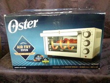 oster compact air fry oven, 6 functions, stainless steel finsh. used 1 time