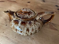 Vintage unusual medium oval tea pot, glossy brown/white flecking