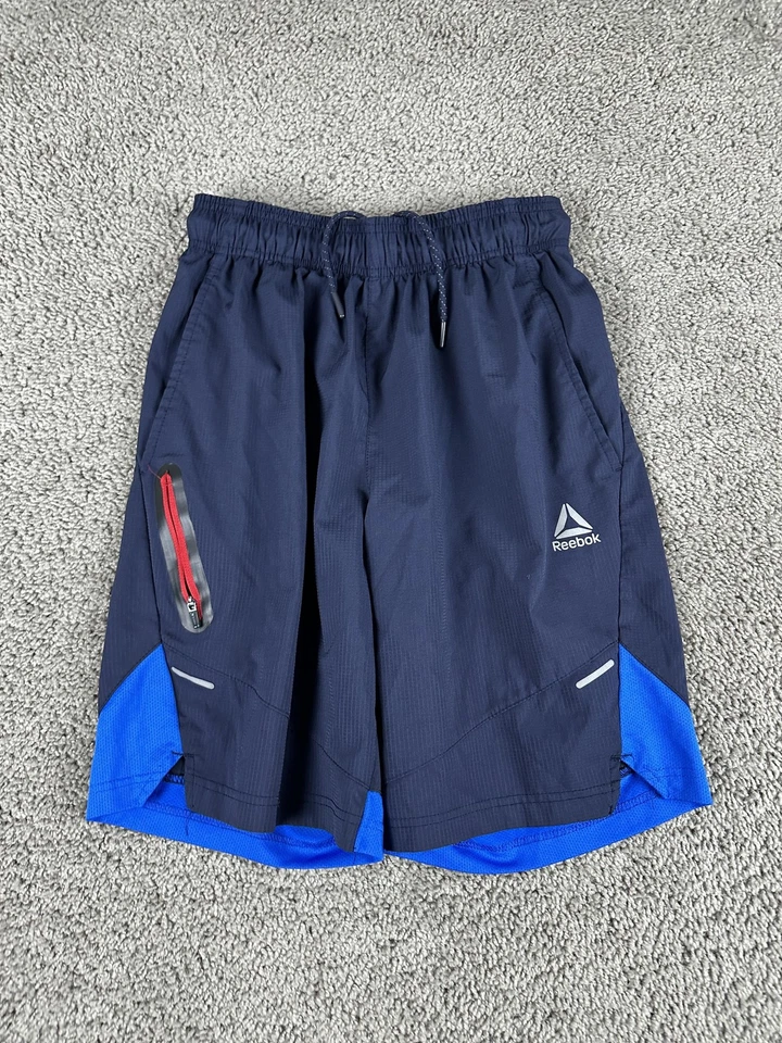 Pantalones Cortos Atléticos para Correr Reebok Para Hombres Pequeños Bolsillo con Cremallera Elastizados Reflectantes Gimnasio Fitn Foto 2 de 4