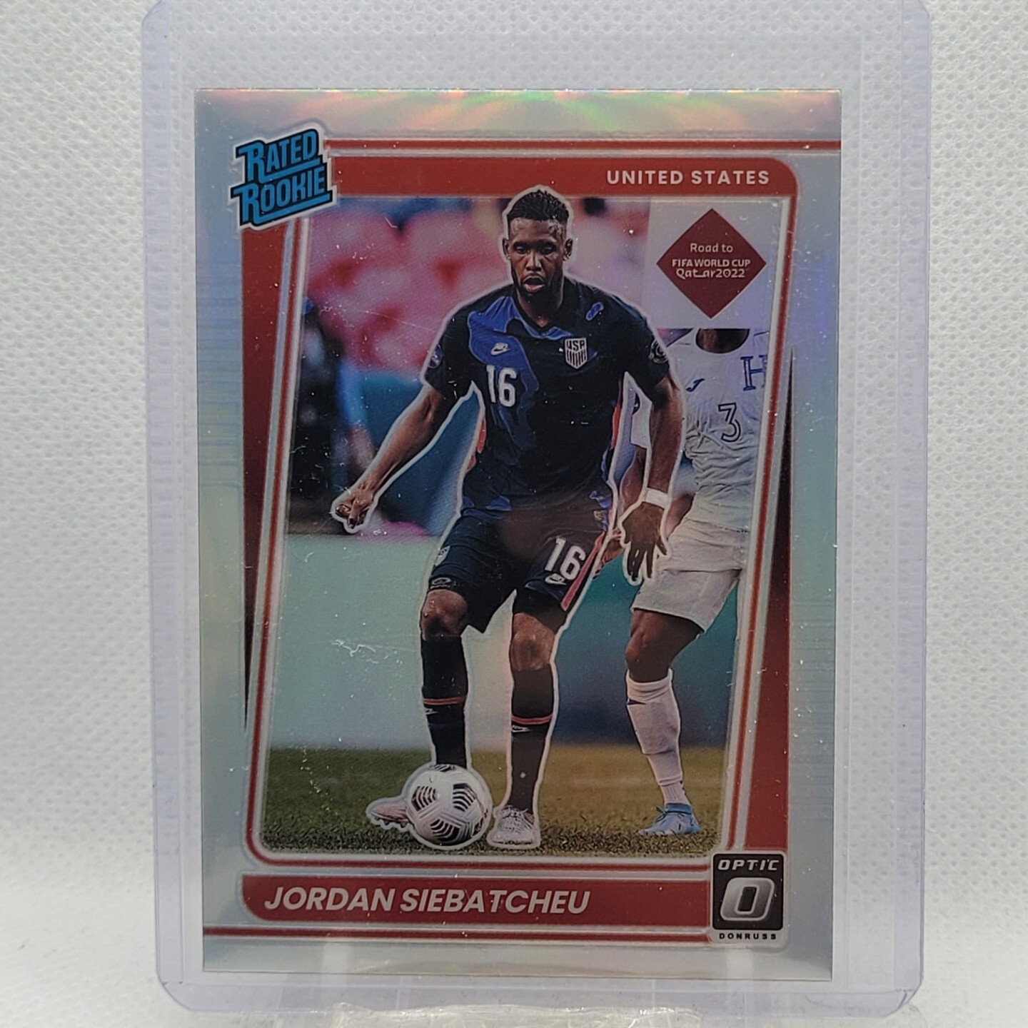 2021-22 Donruss Optic Soccer Jordan Siebatcheu Rated Rookie Silver Holo Prizm RC