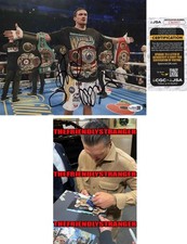 Oleksandr Usyk signed "BOXING CHAMPION" 8x10 Photo BELTS a Autographed JSA COA