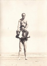 intage Photo - Young man gives mature partner a piggy-back ride - Gay interest