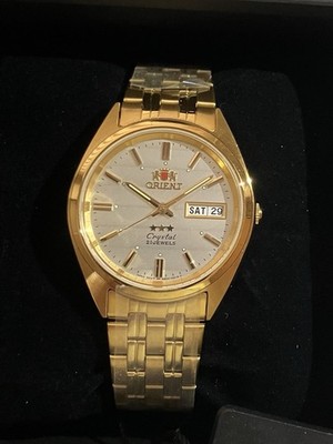 New Orient TriStar Automatic, FAB00008W9, Gold Tone, Day Date, New In Box