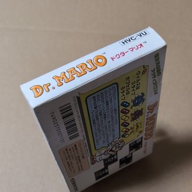 There is a box theory Dr. Mario Nintendo FC Famicom Retro game Manual with