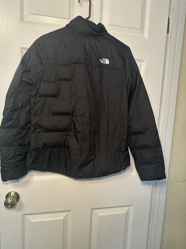 The North Face 550-fill insulated puffer jacket in classic black.