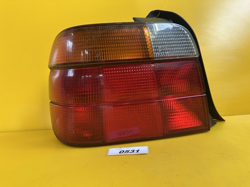 Orig.  BMW 3er E36 Limosuine Rücklicht Heckleuchte hinten links + Lampen träger