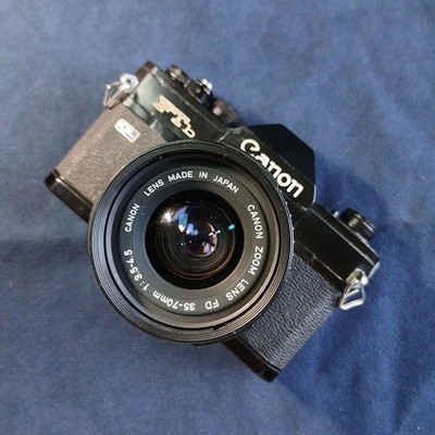 Canon FTb-N analoge Spiegelreflexkamera schwarz mit FD 35-70mm Zoomobjektiv g...