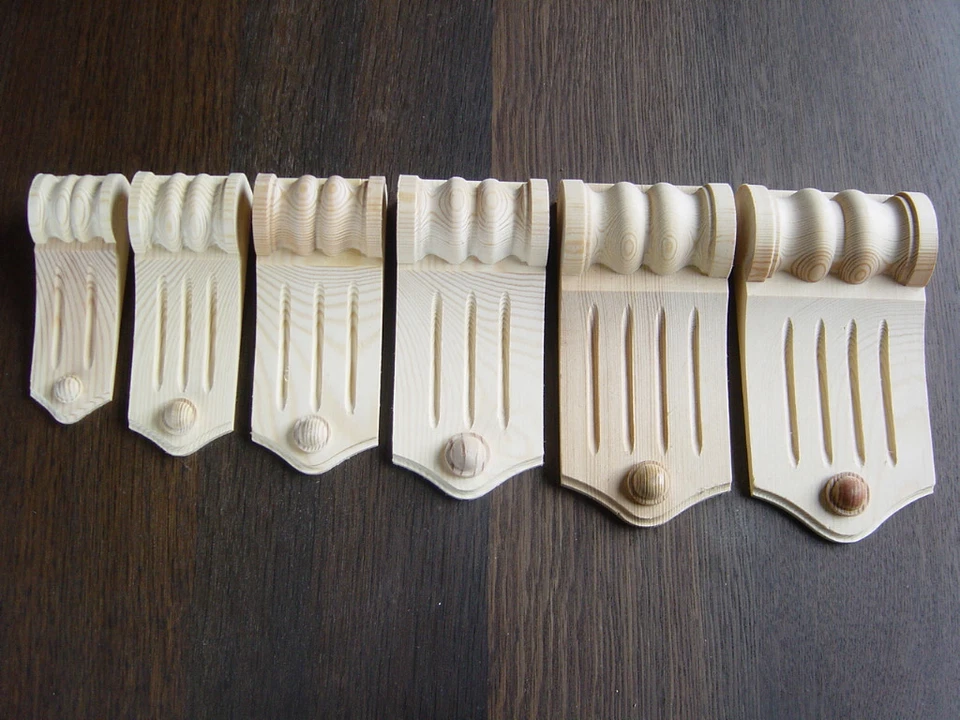 Feine Auflagen-Gründerschnecken-Aplikatione-Schnitzereien-Halbrollen in Tanne