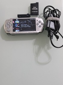 Sony PSP Console Silver Wi-Fi with Charger, Battery Pack, 5 Games, Rare Camera 