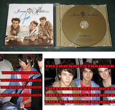 Rare JONAS BROTHERS ALL 3 signed "LINES VINES TRYING TIMES" JAPAN CD - Proof COA