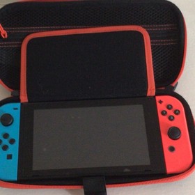 Nintendo Switch Console 32GB Neon Blue/Neon Red Joy-Con w/ Carrying Case