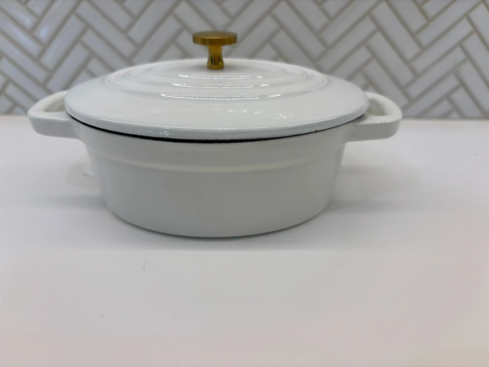 Nikko oval enameled cast iron Dutch oven or casserole dish with lid 3" tall, 7"