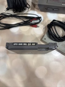 Nintendo NES Console 2 OEM Controllers With Super Mario Bros. And Duck Hunt