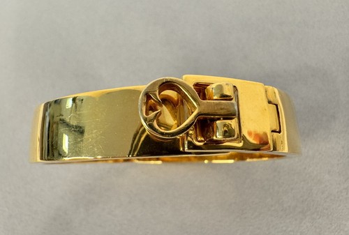 Kate Spade New York Gold Tone Fold Over Clasp Hinge Bangle Bracelet