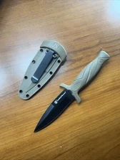 Smith & Wesson  Boot Fixed Knife 3" Stainless Steel Blade Tan Rubber Handle